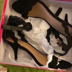 Cute little black heels never worn!